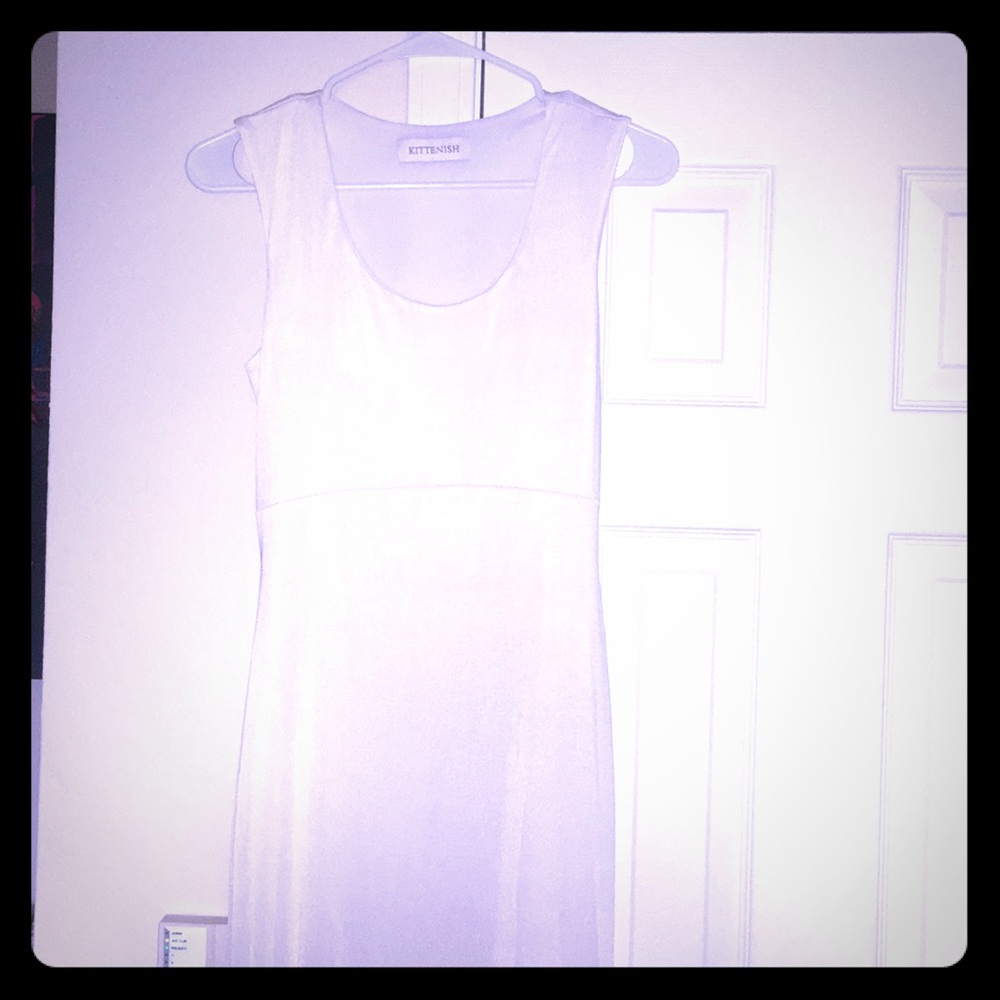 White floor length dress with slit